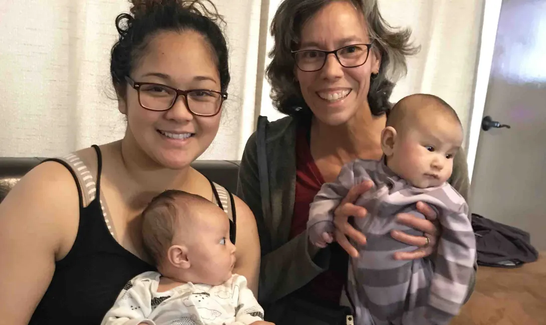 Marjourie Solano and Heather Preece of Kodiak KINDNESS with infants in the program.