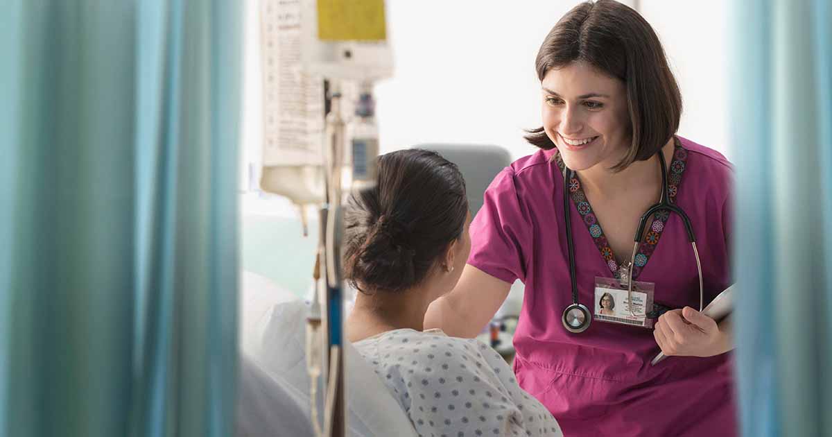Healthcare worker talking to patient