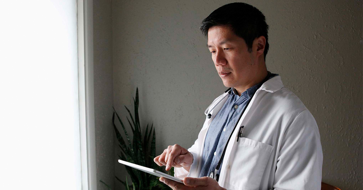 Doctor holding tablet