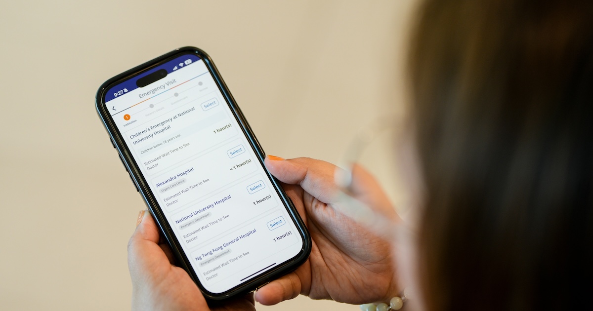 A user checking wait times across NUHS emergency departments on the NUHS mobile application