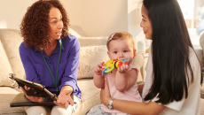 Parent and child talking to provider
