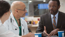 Doctors meeting with executive