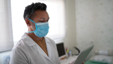 A doctor with a tablet