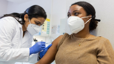 A person getting a vaccine shot
