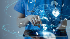 Healthcare worker using tablet with healthcare icons swirling above
