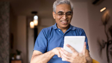 man holding a tablet