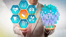A person in a suit holds graphic healthcare solutions in one hand, and a graphic of people in the other.