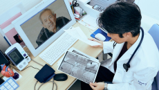 A telehealth patient speaks with a doctor
