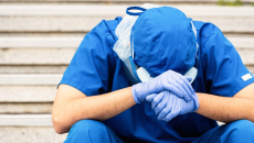 A burned-out clinician in PPE
