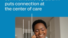 Healthcare worker talking on the phone and looking at pack of pills