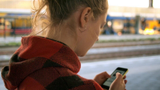 A person looking at their smartphone