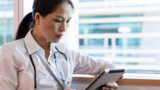 A doctor with a tablet