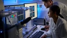 Doctors at computer