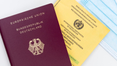 A European Union passport and a WHO yellow card