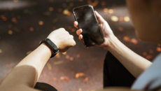 A person looking at their smart watch