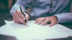 A person signing a document