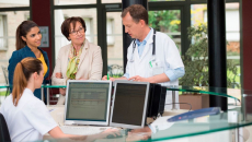 Clinicians gathered in the nurses' station