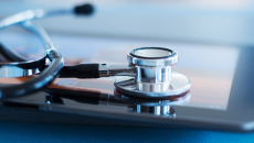 stethoscope on top of an iPad