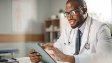 Doctor using tablet