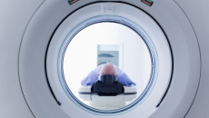 A patient undergoing CT scanning