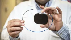 Person holding medical device