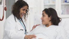 A doctor checking up on a pregnant patient