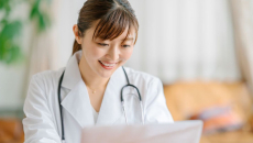 Doctor takes a telehealth visit from her home