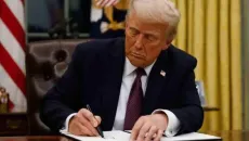 President Donald Trump singing bill