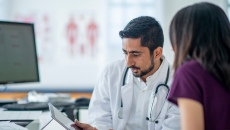 Doctor and patient with computer