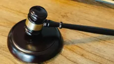 gavel on wood tabletop
