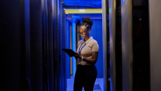 An engineer assessing data servers