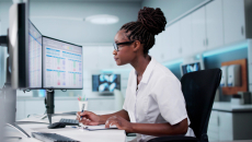 A clinical staff analysing data