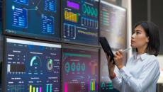 Healthcare employee with AI analytics dashboards