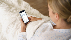 patient holding a smartphone