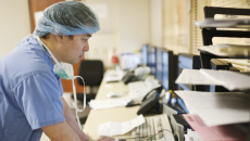 Doctor on computer in hospital