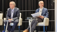Jeff Coughlin, senior government relations director at HIMSS, left, and  Dr. Steven Lane, clinical informatics director at the Sutter Health Palo Alto Medical Foundation, speak Monday at HIMSS22 in Orlando.