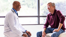 Doctor talking to patient