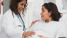 obstetrician checks a maternity patient