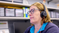 A clinician providing a virtual consultation with a patient from prison