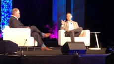 Reid Oakes, executive vice president of Analytics at HIMSS, talks to MLB veteran Theo Epstein, at HIMSS21 in Las Vegas on Monday.