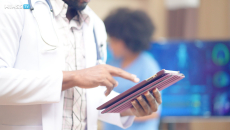 Healthcare worker using tablet