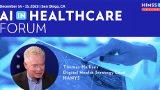 Tom Hallisey at HANYS_ Doctor looking at brain scan on table Photo: katleho Seisa/Getty Images