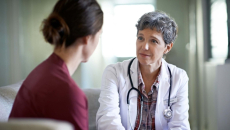 Doctor talking to patient