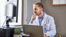 Healthcare professional at desk