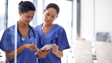 Nurses using a tablet