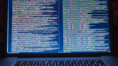 Code on two side-by-side vertical screens