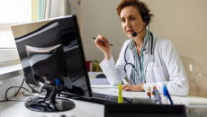 Doctor conducting telehelth appointment