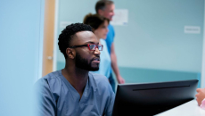 Healthcare worker using a computer