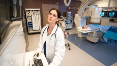 A radiologist checking a patient's scan