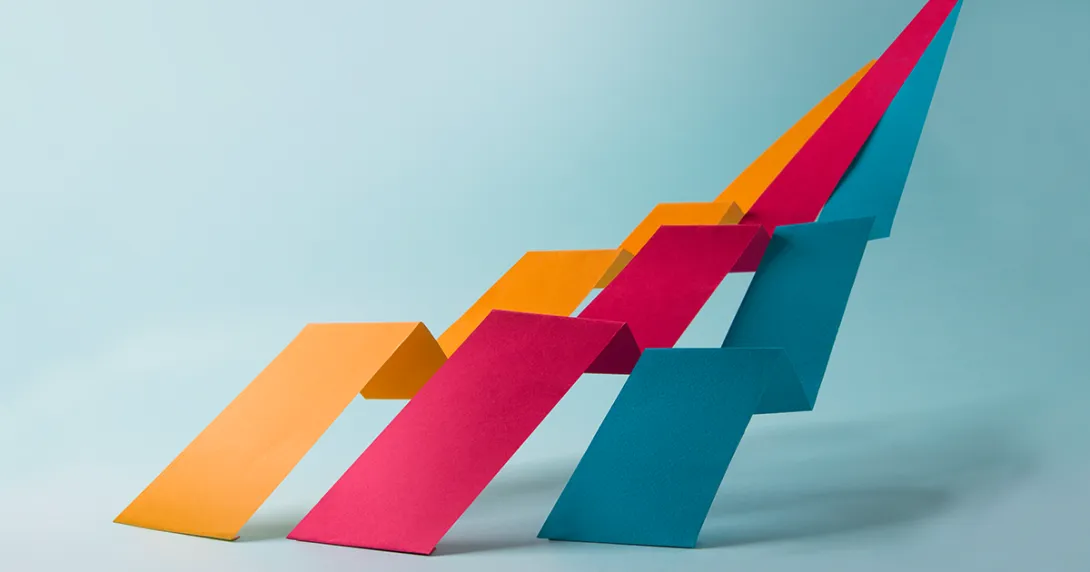 Three arrows point upward and joining at the top point symbolizing integration